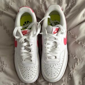 Nike Kids White Sneakers with Pink Accents